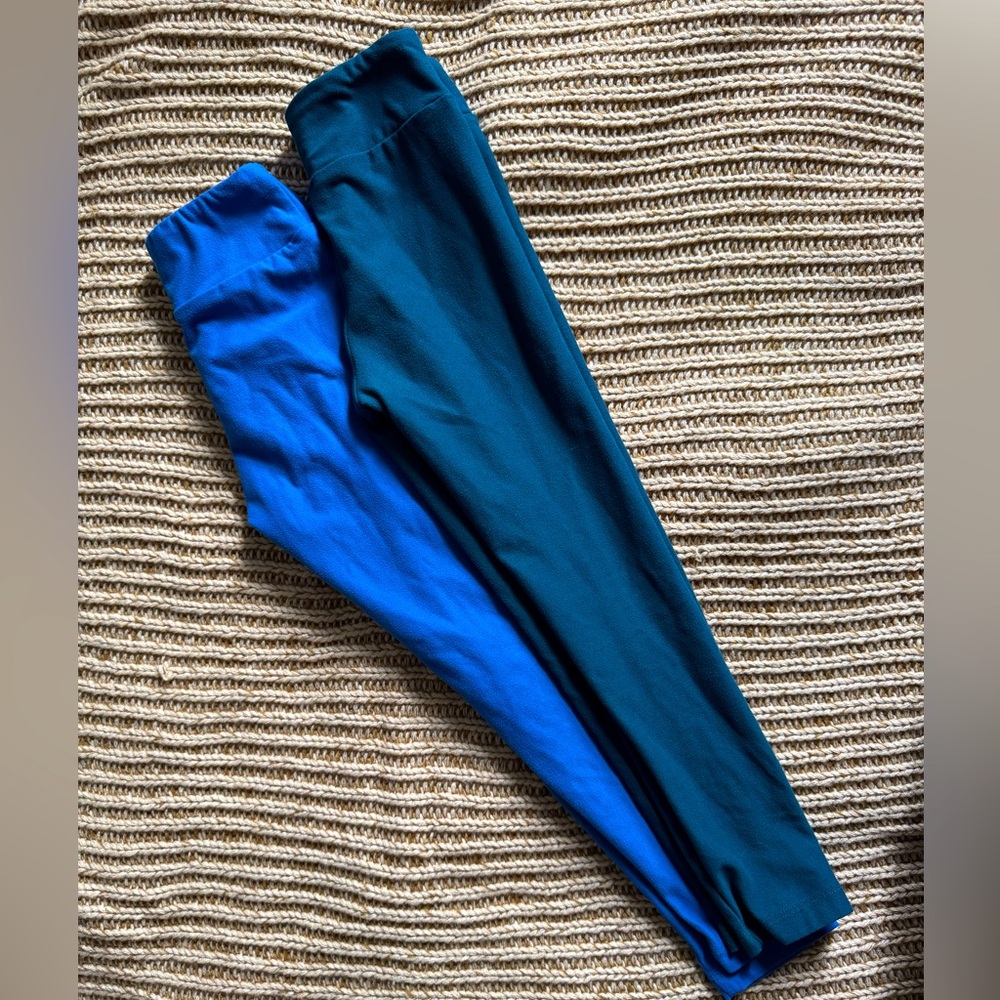 Pair of Lularoe kids leggings, size S-M in classic and marine blue.